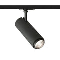 Musta FOCUS 20 LED valonheitin 1-vaihekiskolle, sivunäkymä – Musta FOCUS 20 valonheitin, joka on asennettu 1-vaihekiskoon, kuvattuna sivulta.